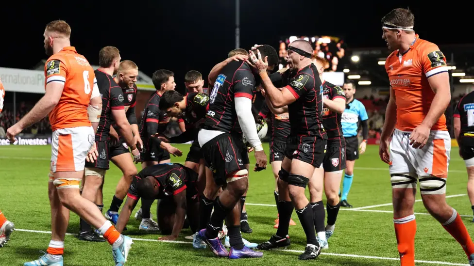 Gloucester edge Edinburgh in stormy conditions